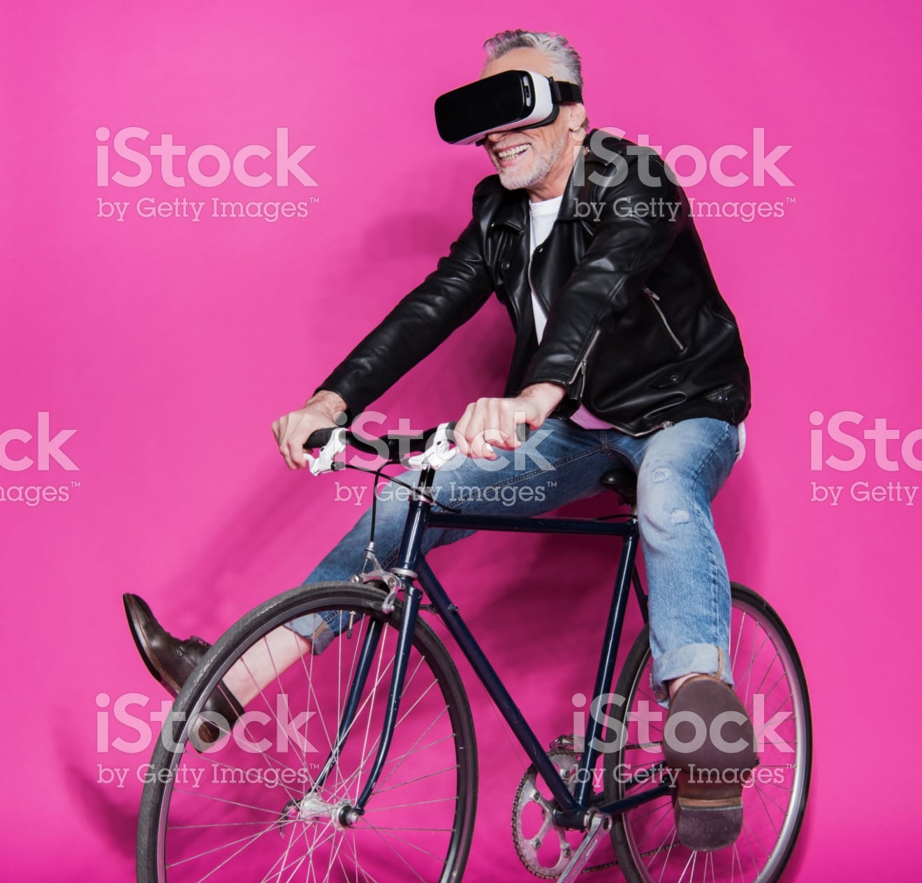Man riding bicycle while wearing VR headset